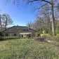 Vue extérieure maison familiale Le Coudray terrain boisé 2700 m²